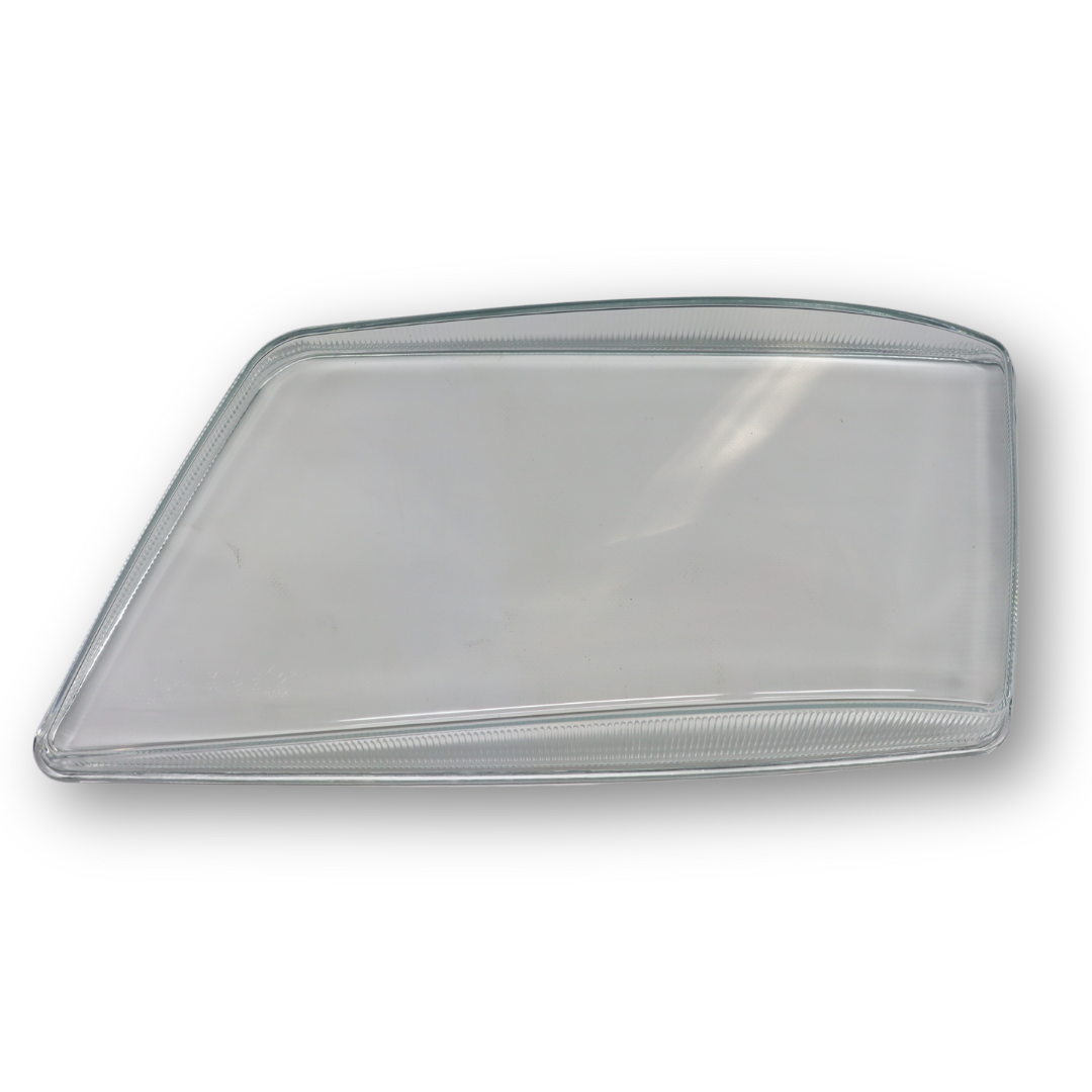 Стекло фары MAN TGX, TGS (2006- ...) левое (AYFAR) Стекло фары MAN TGX, TGS (2006- ...) левое (AYFAR)