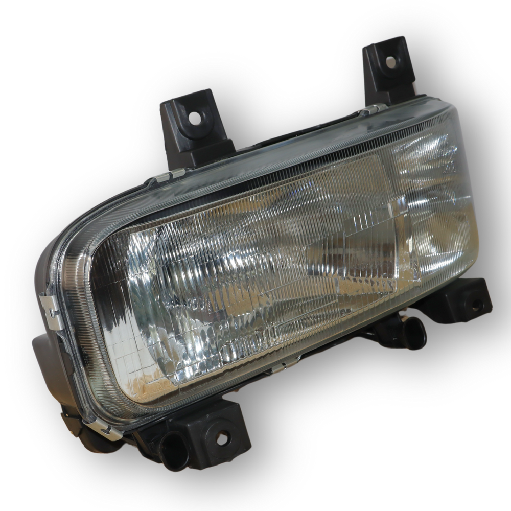 Фара MERCEDES ATEGO 1 (1998-2004) з розсіювачем, ліва (TANGDE) Фара MERCEDES ATEGO 1 (1998-2004) з розсіювачем, ліва (TANGDE)