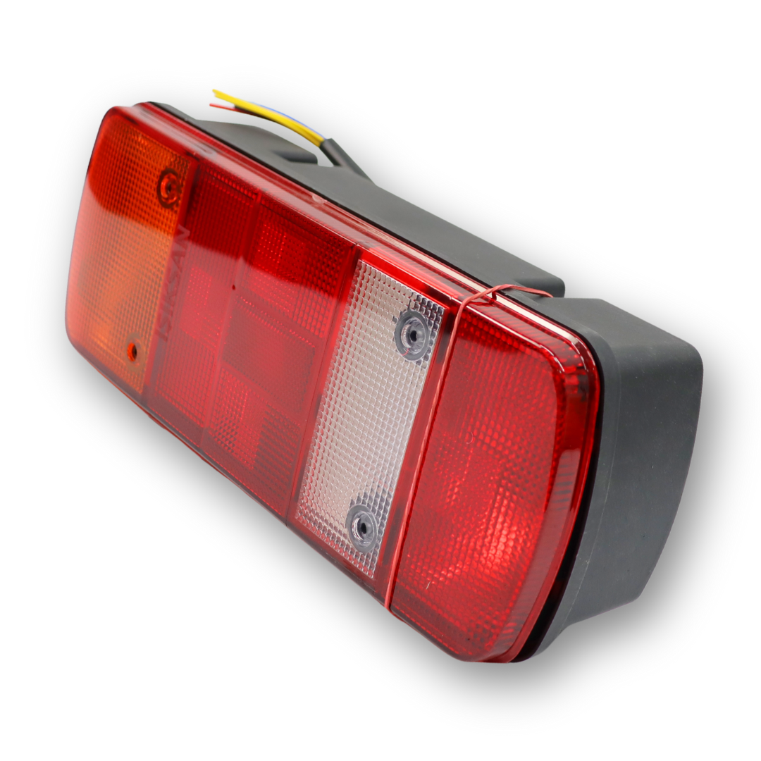 Фонарь задний MAN L, VOLVO FL, DAF LF , с кабелем левый (ISS) Фонарь задний MAN L, VOLVO FL, DAF LF , с кабелем левый (ISS)