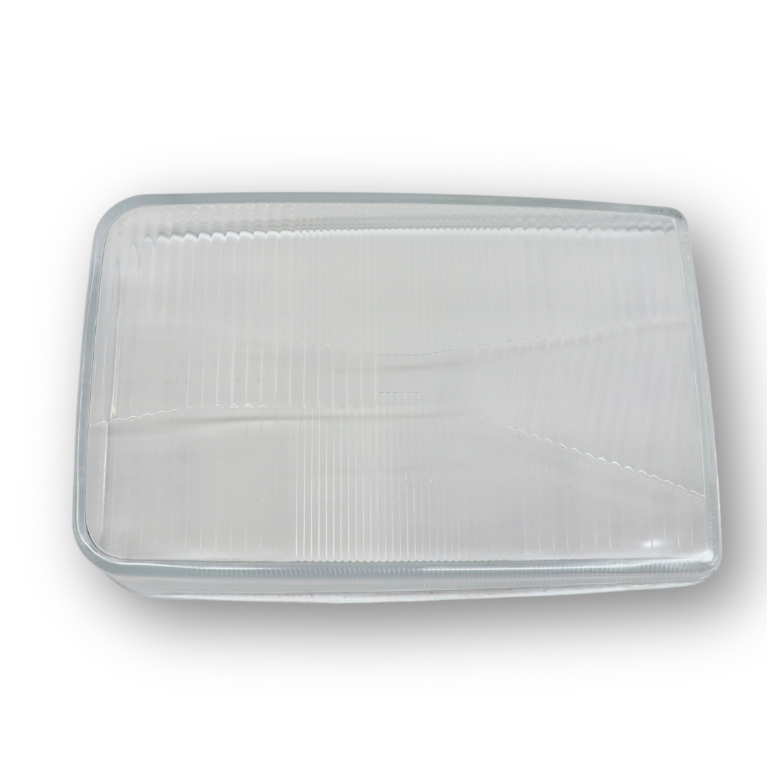 Стекло фары DAF XF 95 (1997-2002) левое (TANGDE) Стекло фары DAF XF 95 (1997-2002) левое (TANGDE)