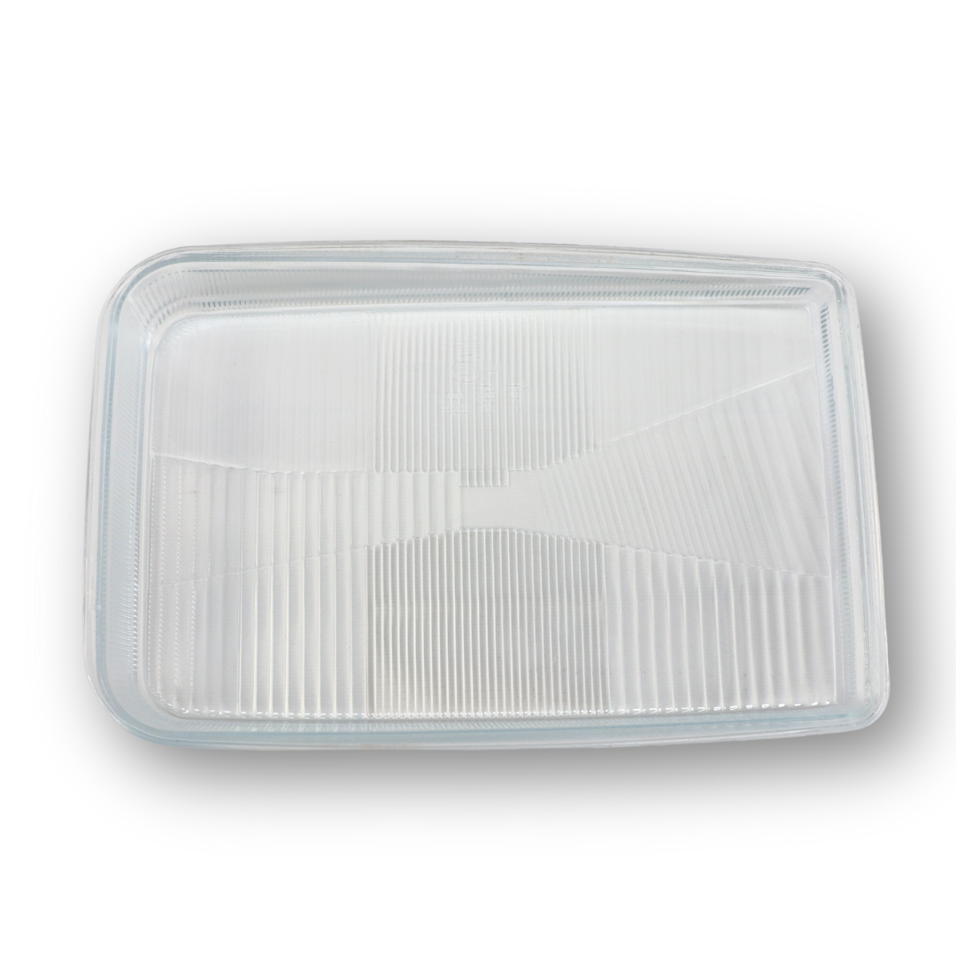 Стекло фары DAF XF 95 (1997-2002) левое (TANGDE) Стекло фары DAF XF 95 (1997-2002) левое (TANGDE)