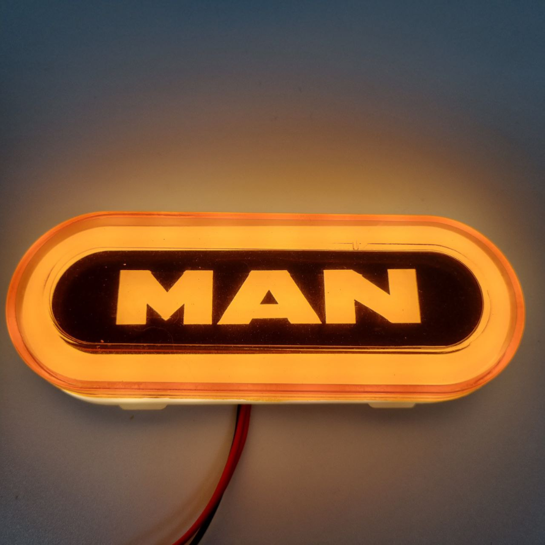Фонарь габаритный NEON с логотипом "MAN"желтый \с креплением \ Фонарь габаритный NEON с логотипом "MAN"желтый \с креплением \