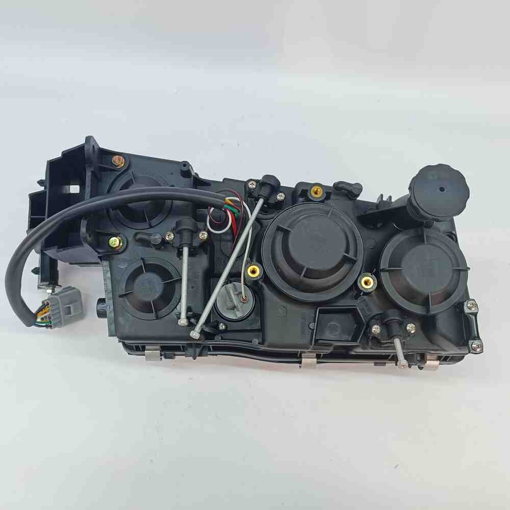 Фара VOLVO FH, FH12, FH16, FM (2002-2008) ручная регулировка; прямоугол.разъем, левая (TANGDE)