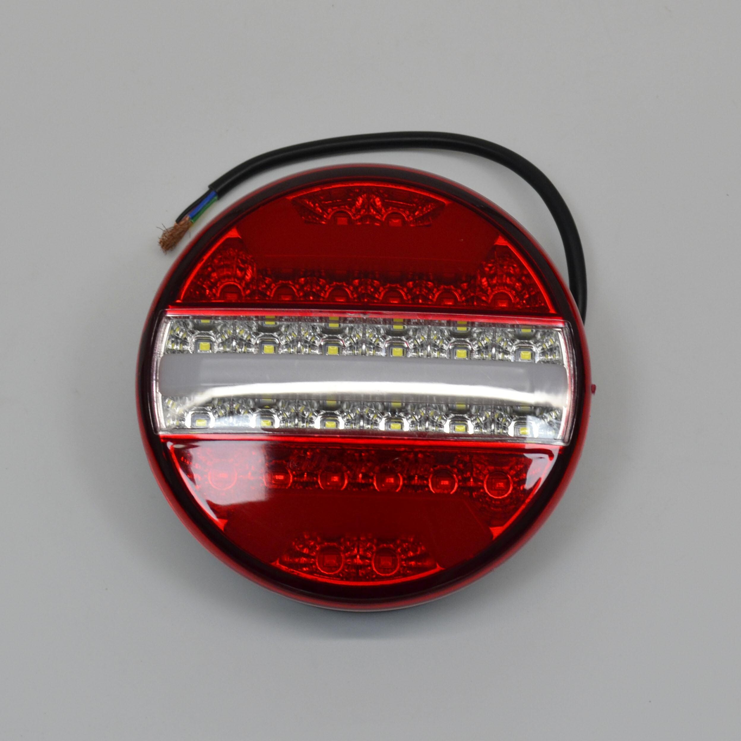 Фонарь задний неоновый круглый диодный 24 V(140*51*крепл,80мм М6) Фонарь задний неоновый круглый диодный 24 V(140*51*крепл,80мм М6)