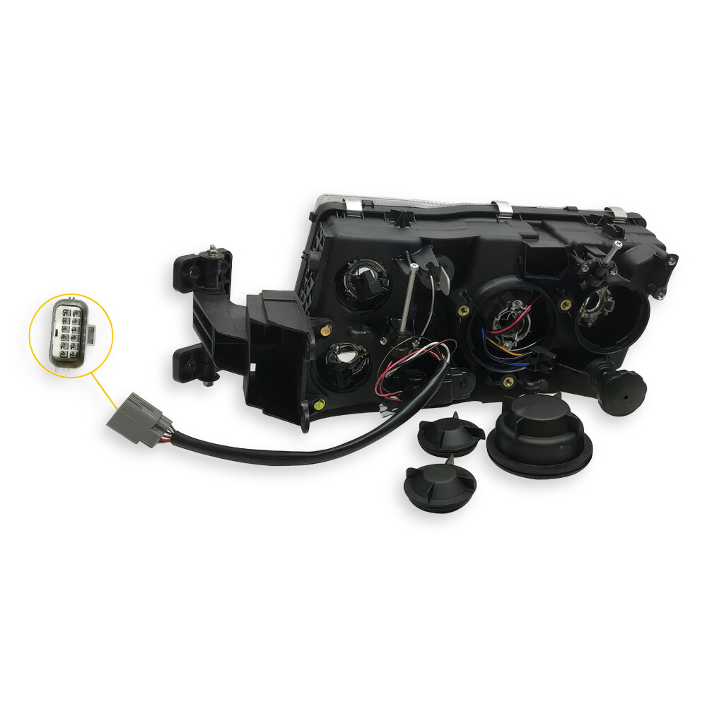 Фара VOLVO FH, FH12, FH16, FM (2002-2008) ручне регулювання; прямокут.роз'єм, ліва (TANGDE)