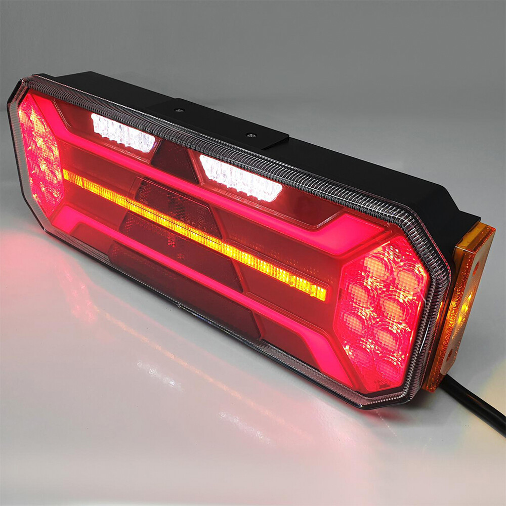 Фонарь задний FERZE 350х131х60 \правый\ бег.указ.поворота , каб.  подсв. ном.