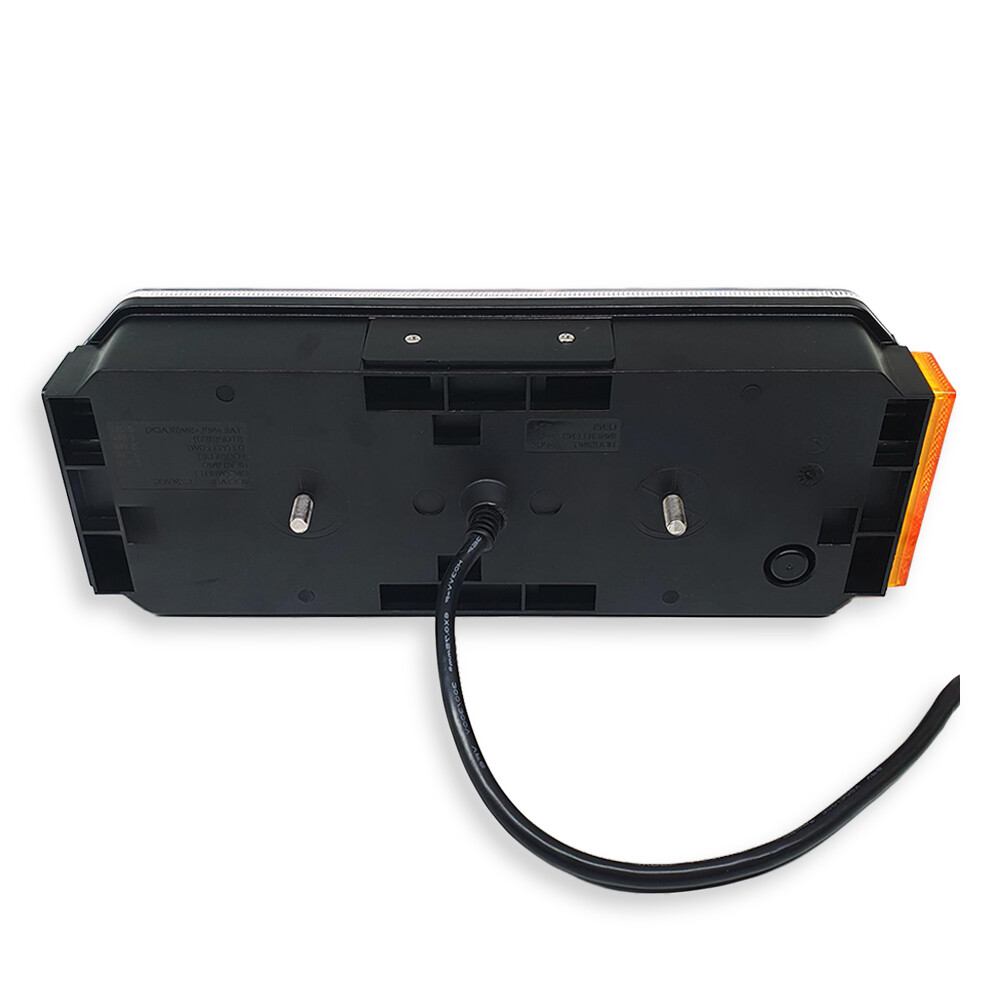 Фонарь задний FERZE 350х131х60 \прав.\ бег.указ.поворота , каб.  подсв. ном.