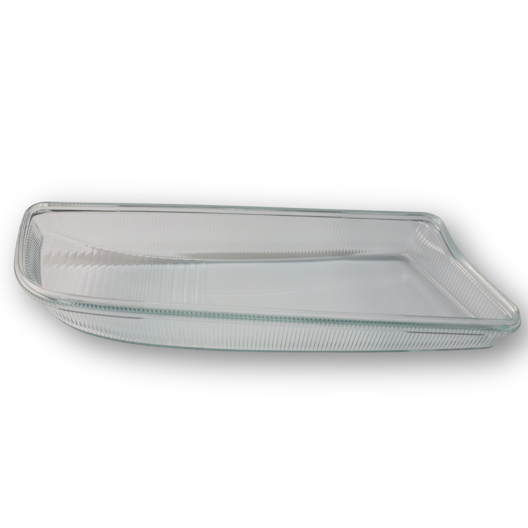 Стекло противотуманной фары MAN TGX, TGS (2006- ...) с уплотнителем, левое (TANGDE) Стекло противотуманной фары MAN TGX, TGS (2006- ...) с уплотнителем, левое (TANGDE)