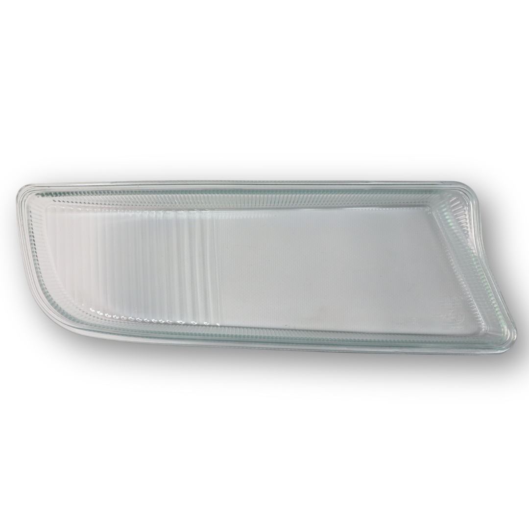 Стекло противотуманной фары MAN TGX, TGS (2006- ...) с уплотнителем, левое (TANGDE) Стекло противотуманной фары MAN TGX, TGS (2006- ...) с уплотнителем, левое (TANGDE)