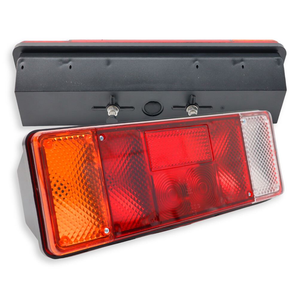 Фонарь задний 12V-24V   стоп / габаритный / указ повор./ подсв.номера \WAS\ лев.