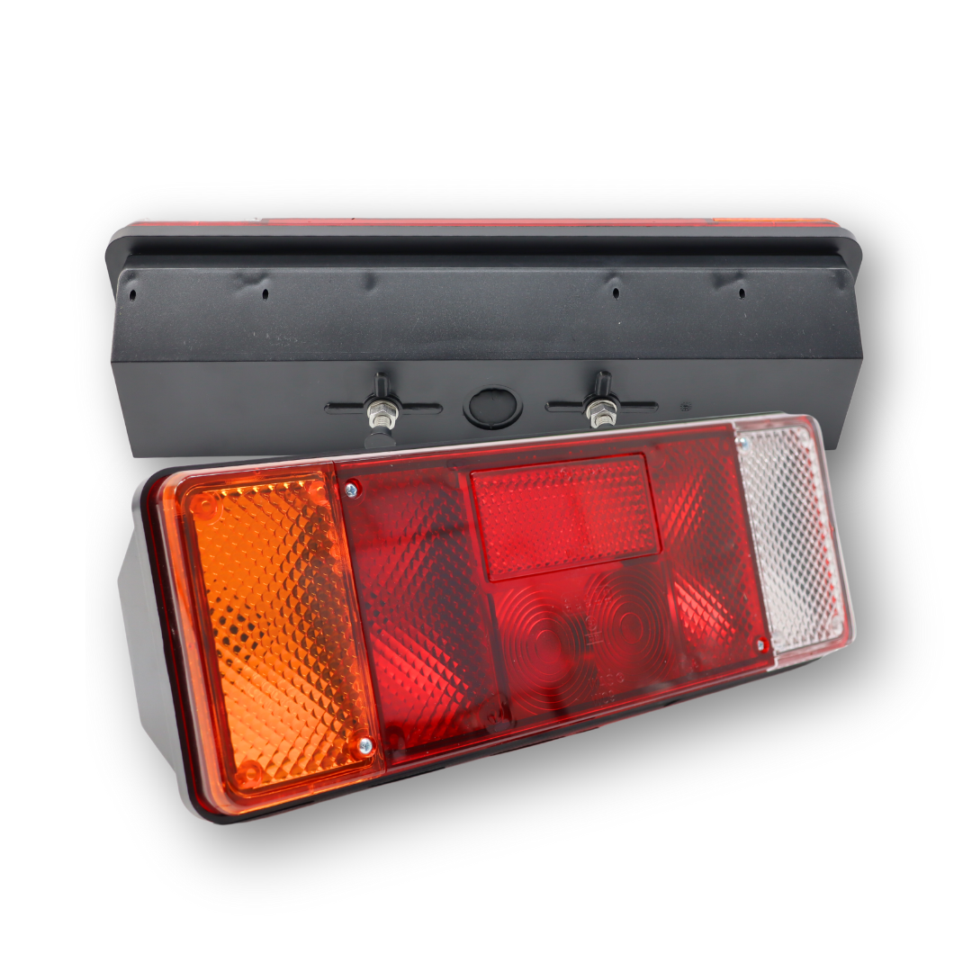 Фонарь задний 12V-24V   стоп / габаритный / указ повор./ подсв.номера \WAS\ лев.