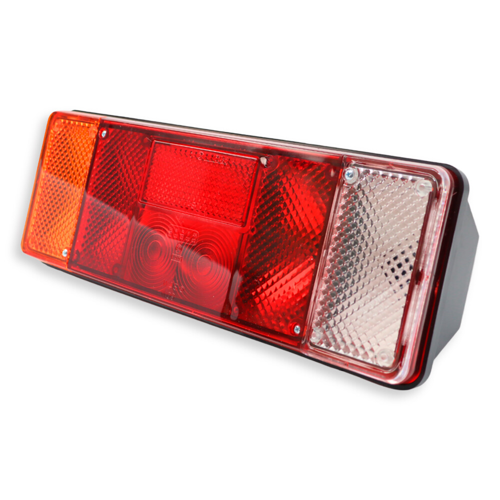 Фонарь задний 12V-24V   стоп / габаритный / указ повор./ подсв.номера \WAS\ лев.