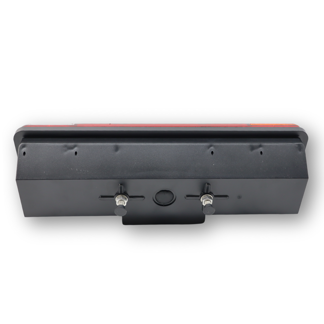 Фонарь задний 12V-24V   стоп / габаритный / указ повор./ подсв.номера \WAS\ лев.