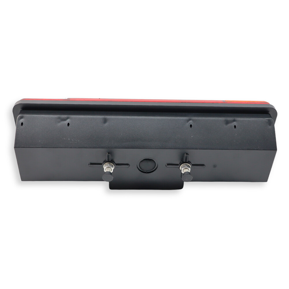 Фонарь задний 12V-24V   стоп / габаритный / указ повор./ подсв.номера \WAS\ лев.