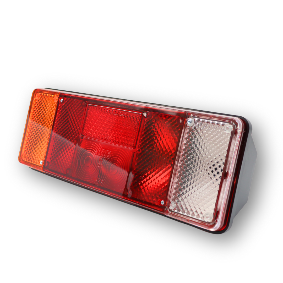 Фонарь задний 12V-24V   стоп / габаритный / указ повор./ подсв.номера \WAS\ лев.