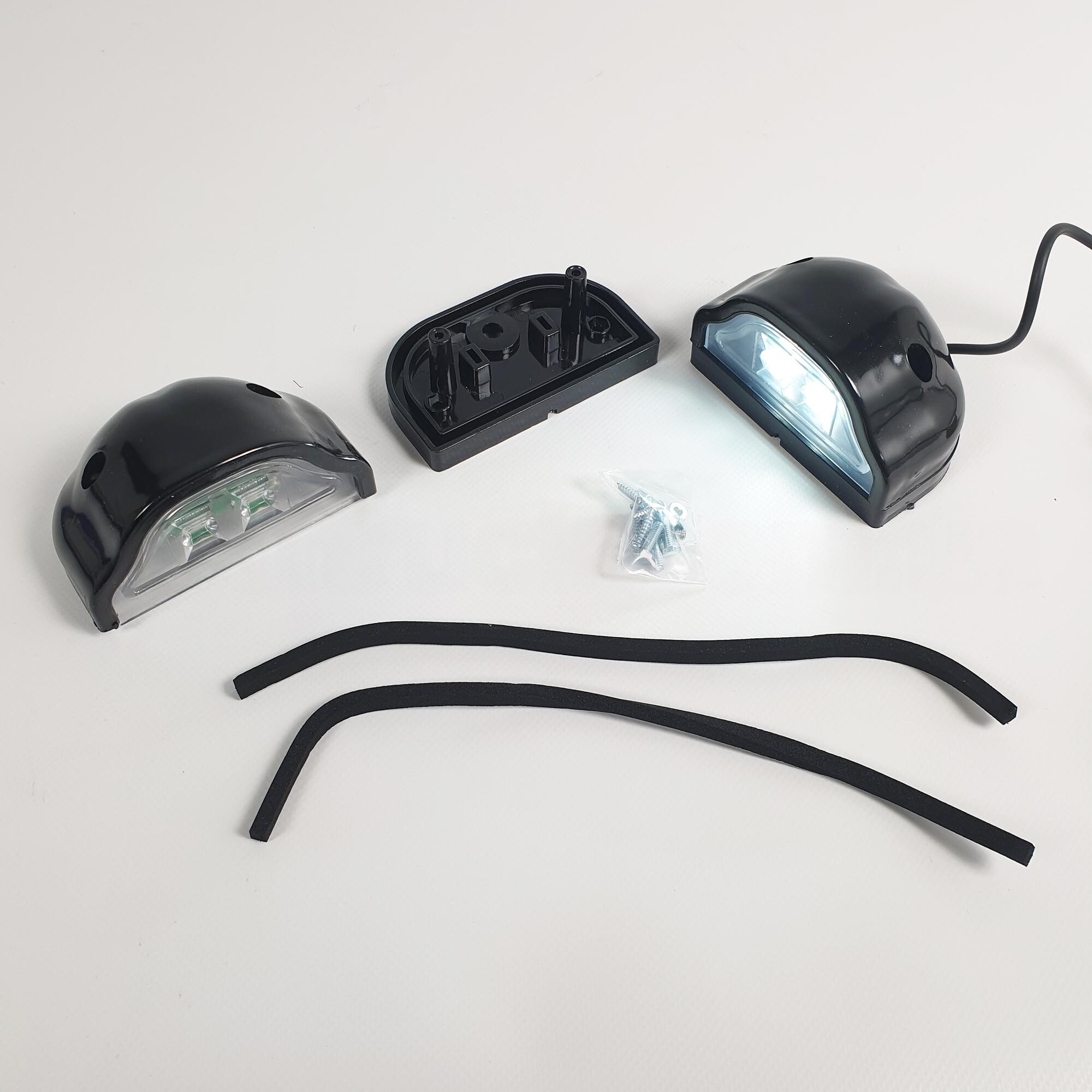 Подсветка номера "волна" черная  LED \NOKTA\ 12v